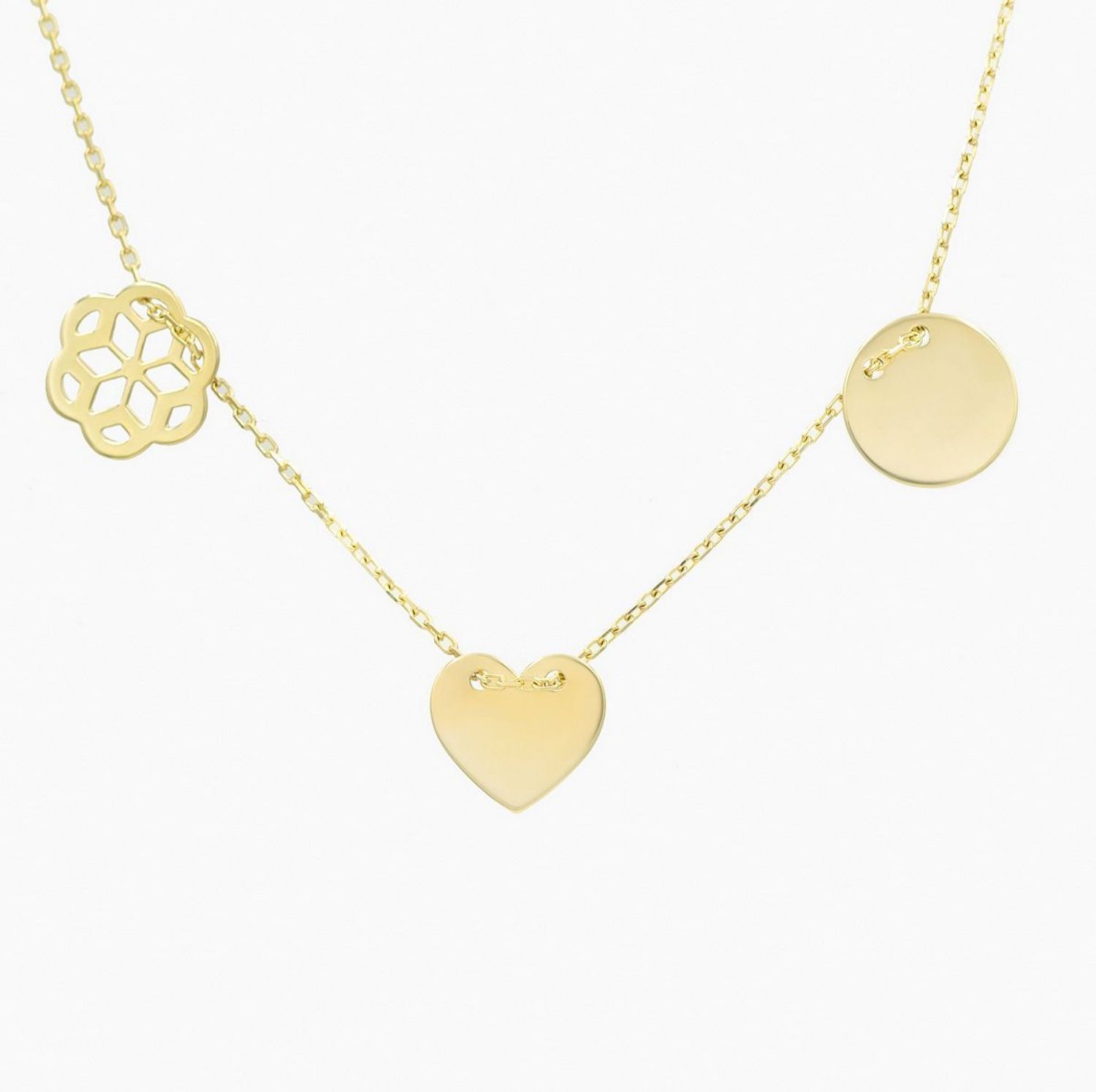 Złoty naszyjnik z trzema zawieszkami – harmonia detali.jpg